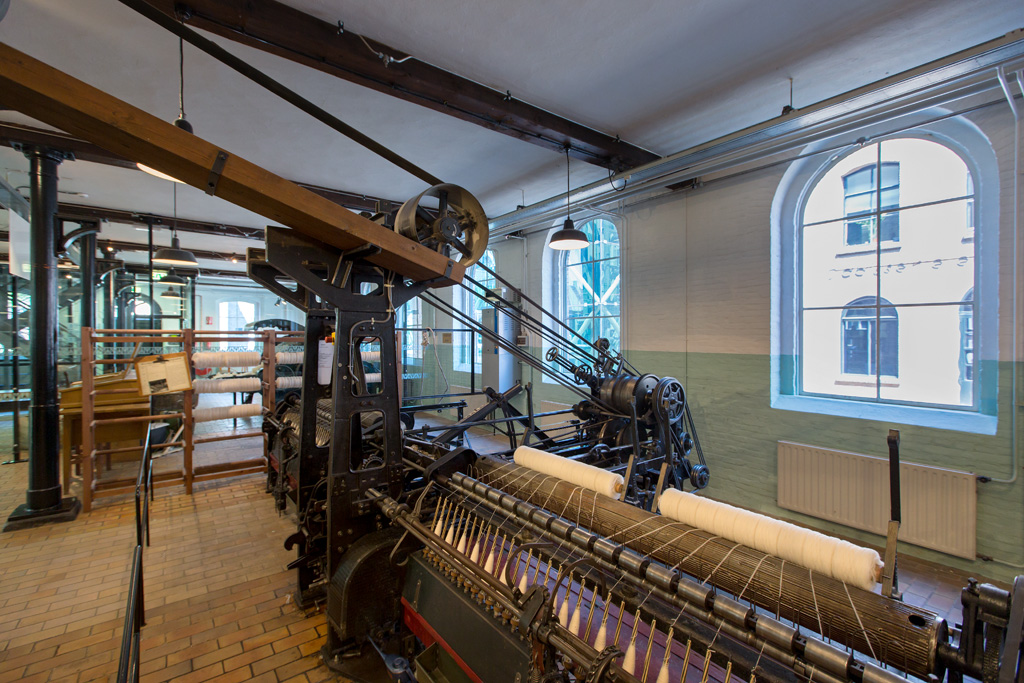 Historische textielmachine in het TextielMuseum als beeld van techniek en vakmanschap